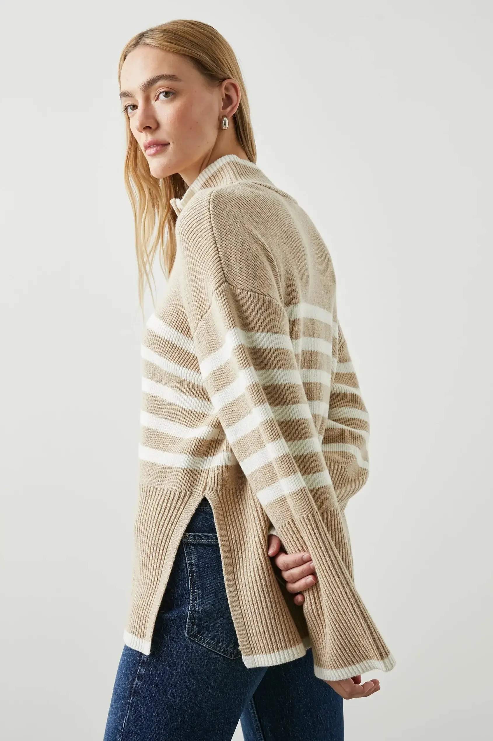 Certainly! Heres an optimized title for the product:

Womens Tessa Sweater - Sand Stripe Knitwear for Cozy Style

This title includes modifiers that enhance searchability and appeal.